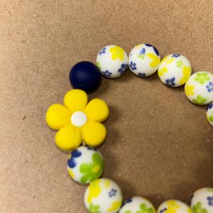 yellow flower wristlet