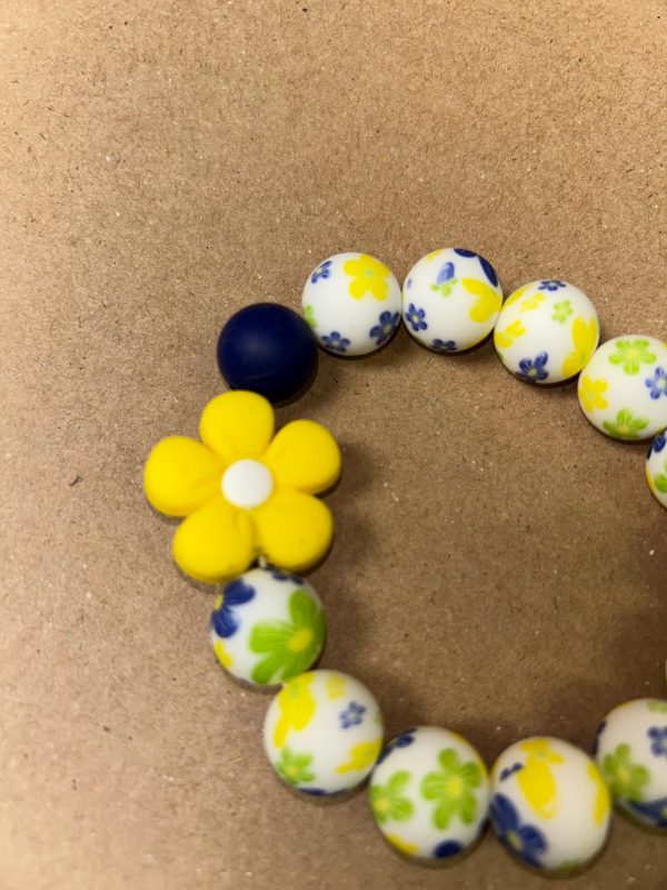 yellow flower wristlet